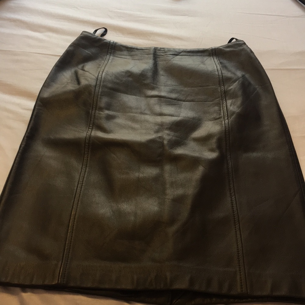 Ladies beautiful Black leather skirt . Size 2.